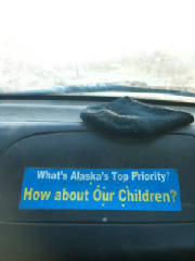 Sticker on the dashboard about Alaska's priorities